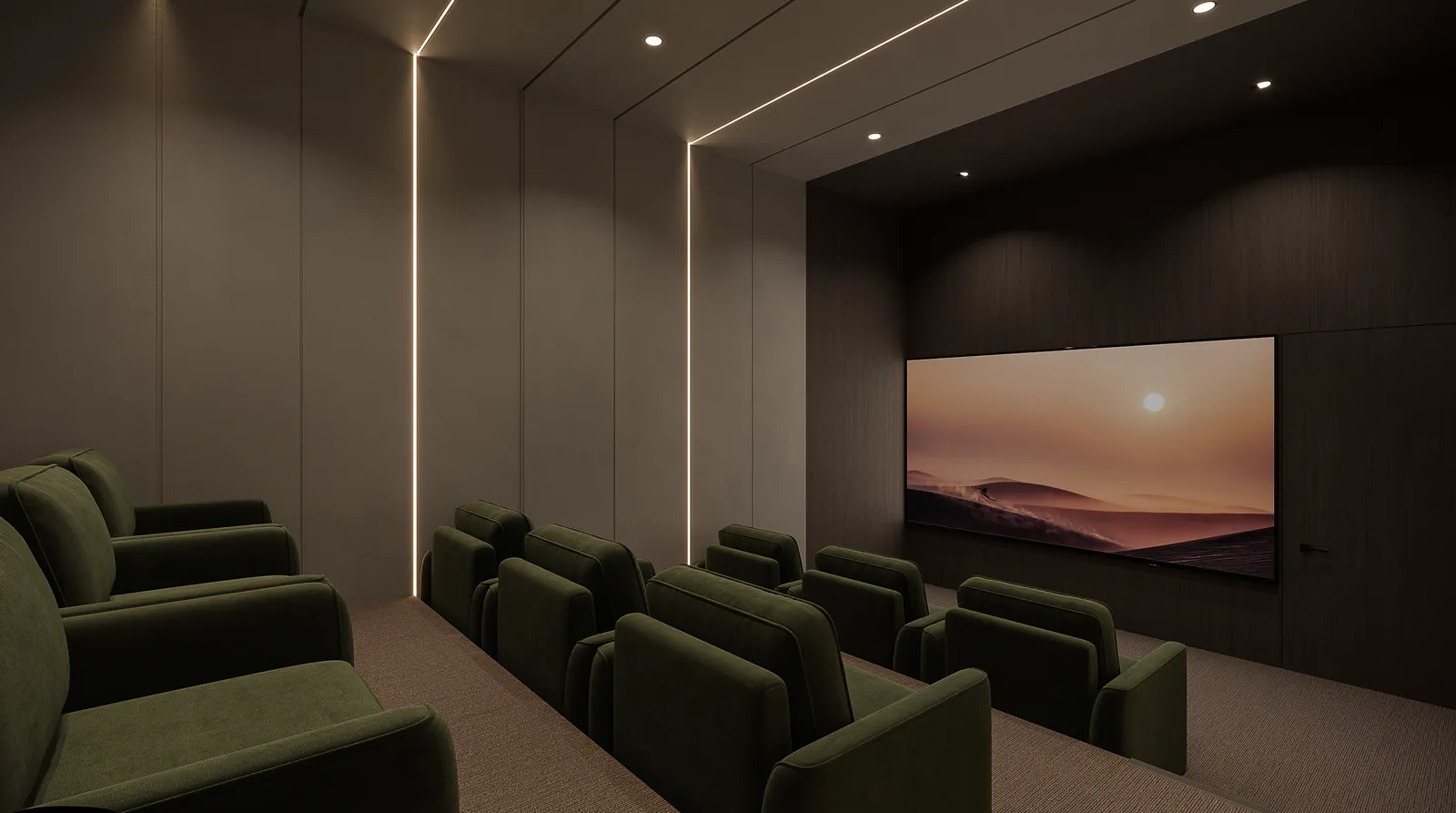 Sala de cine privada con butacas verdes y gran pantalla.